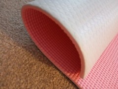 ELLE Sport branded yoga mat for sale. Has a visible logo ELLE Sport on the side.