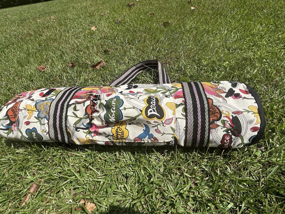Sakroots Peace Yoga Exercise Mat Tote Duffle Bag Over Shoulder With A Purple Mat