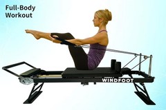 High Quality Foldable Pilates Reformer with Padded Rebounder for Cardio Fitness
