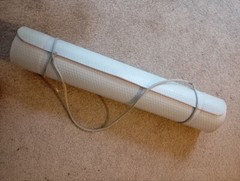 ELLE Sport branded yoga mat for sale. Has a visible logo ELLE Sport on the side.