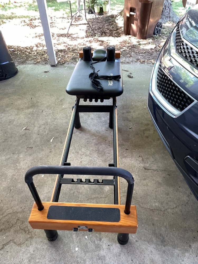 Pilates machine with stand