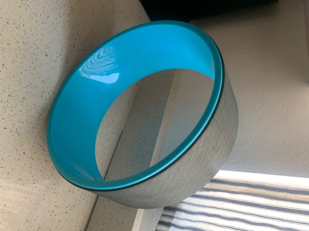 Slightly Used Blue Re-spin Yoga Wheel for Stretching and Back Pain