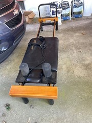 Pilates machine with stand