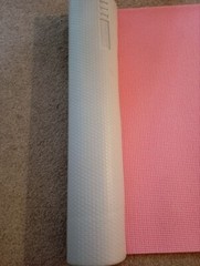 ELLE Sport branded yoga mat for sale. Has a visible logo ELLE Sport on the side.
