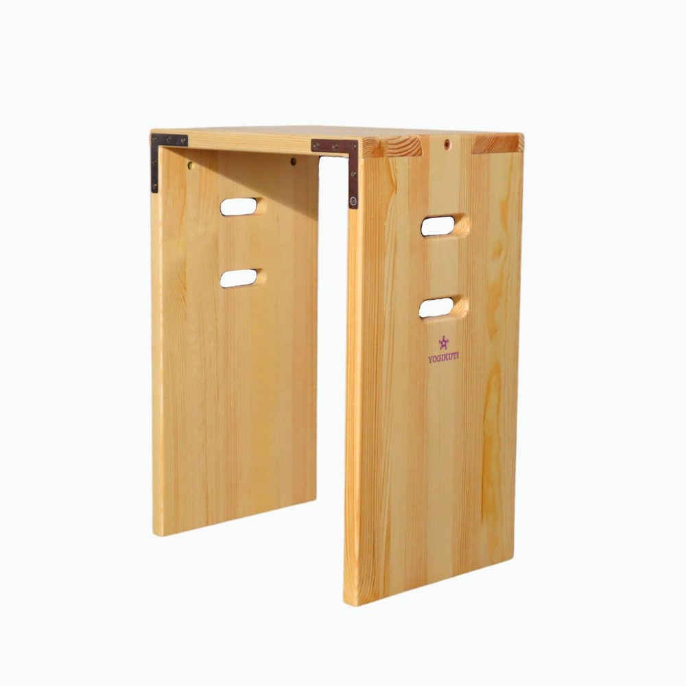 Yogikuti Halasana Box B Yoga Bench providing support & balance in Halasana Pose